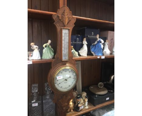 CARVED OAK ANEROID BAROMETER