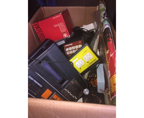 A BOX OF ITEMS INC POLAROID CAMERA, GRANDSTAND COMPUTER CONSOLE AND GAMES ETC