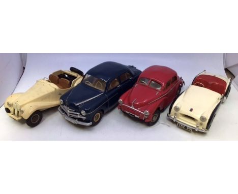 Victory: A collection of four unboxed Victory Industries, battery operated vehicles to comprise: MG TF, white body with brown