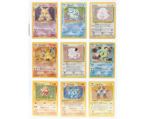 Pokemon: A complete Pokemon Base Card Set, comprising 102 cards, including a 1st Edition Holo Machamp (8/102), contained with