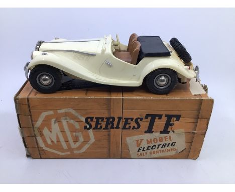 Victory: A boxed Victory Industries, Surrey, battery operated, 1:18 Scale, MG Series TF, ivory white body with brown interior