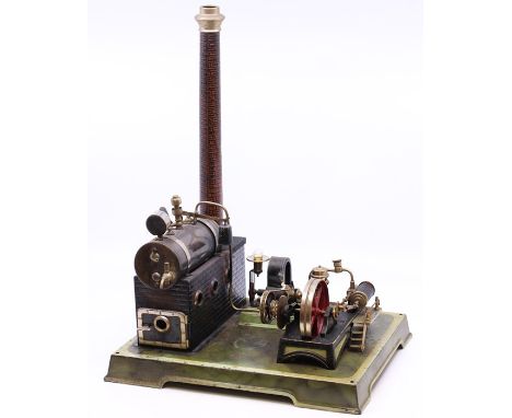 Live Steam: An early 20th century, horizontal live steam, stationary engine, single cylinder, flywheel approx. 3", unmarked, 
