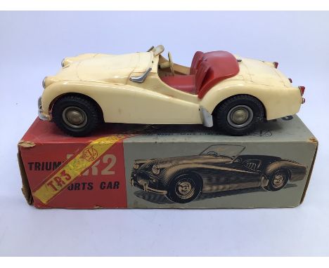 Victory: A boxed Victory Industries, Surrey, battery operated, 1:18 Scale, Triumph TR3 Sports Car, ivory white body with red 