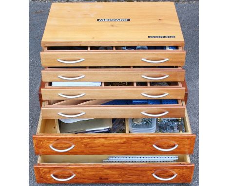 Meccano: A Meccano Outfit No. 10, in original, wooden four drawer cabinet, along with an additional two drawer cabinet, conta