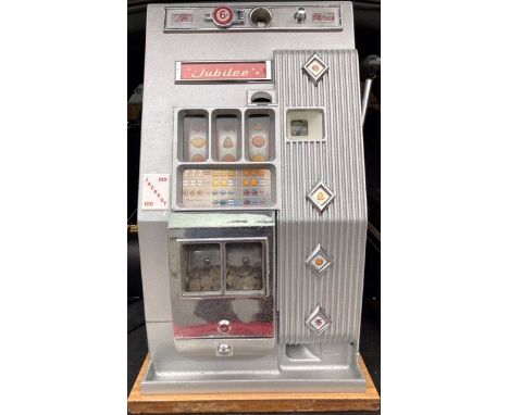 Bandit: A Silver Jubilee Mark 1, one arm bandit slot machine. Refurbished and working on original 6d coin. With jackpot. Plea