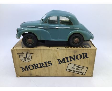 Victory: A boxed Victory Industries, Surrey, battery operated, 1:18 Scale, Morris Minor Saloon, blue/green body with beige in