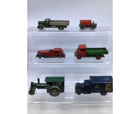 Triang: A Triang Minic tinplate clockwork vehicles to include LNER express parcels van, two open trucks, road roller, sedanca