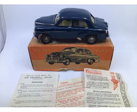 Victory: A boxed Victory Industries, Surrey, battery operated, 1:18 Scale, Vauxhall Velox, blue body with lemon yellow interi