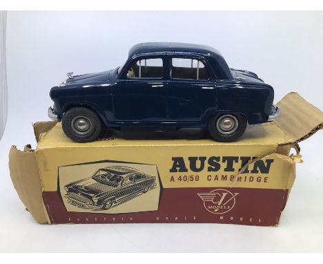 Victory: A boxed Victory Industries, Surrey, battery operated, 1:18 Scale, Austin A40/50 Cambridge Saloon, blue body with bei