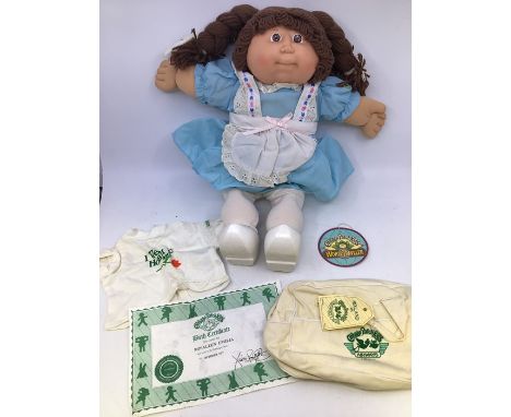 Cabbage Patch Kids: three hard face dolls, two with Birth Certificates, Rosales Amelia and Bobbie Frieda. Rosales has clogs, 