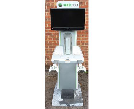 Xbox: An Xbox 360 Display Retail Kiosk, comprising: white console, Samsung TV, and two attached controllers. Kiosk is in need