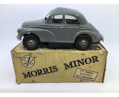 Victory: A boxed Victory Industries, Surrey, battery operated, 1:18 Scale, Morris Minor Saloon, grey body with beige interior