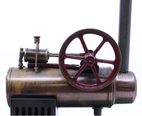 Bing: An early 20th century, horizontal live steam, Gebruder Bing, stationary engine, single fixed cylinder, flywheel approx.