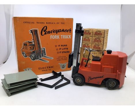 Victory: A boxed Victory Industries. Surrey, battery operated, 1:14 Scale, Conveyancer Fork Truck, red body, a little bit of 