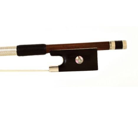 Silver mounted violin bow (with nickel button), unstamped, the stick round, the ebony frog inlaid with pearl eyes and the ebo