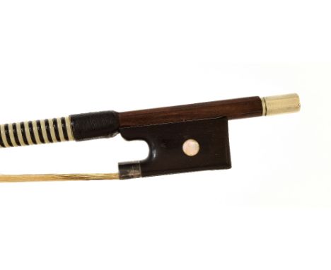 Silver mounted violoncello bow of the Vuillaume School, the stick round, the ebony frog inlaid with pearl eyes and with a lat