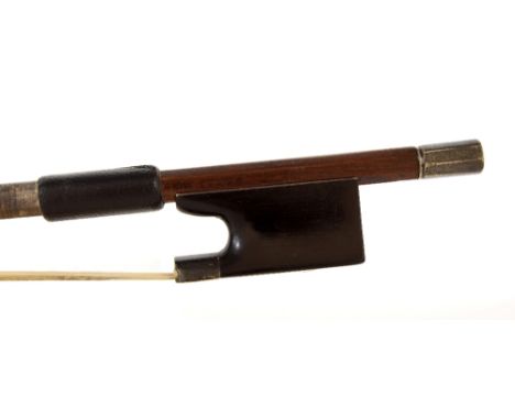 English silver mounted violin bow by and stamped Jas Tubbs, the stick round, the ebony frog plain and with a silver overlaid 