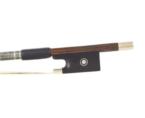 Good French silver mounted violin bow by and stamped E. Sartory á Paris, the stick round, the ebony frog inlaid with silver r