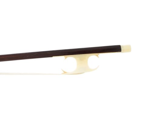 Fine French ivory mounted violin bow of the Nicolas Leonard Tourte School circa 1780, the stick round, with fancy carved ivor