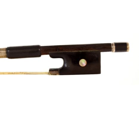 German silver mounted violin bow by and stamped H.R. Pfretzschner, the stick round, the ebony frog inlaid with pearl eyes and