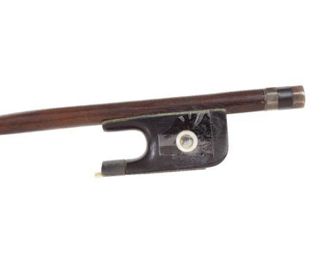 Silver mounted violin bow, unstamped, the stick round, the ebony frog inlaid with silver rings enclosing pearl eyes and the e