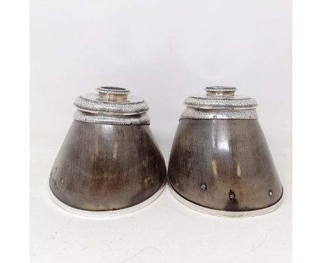 A pair of Victorian novelty candlesticks, in the form of horses hooves, with silver mounts, engraved Mischief, Tyntesfield, 1