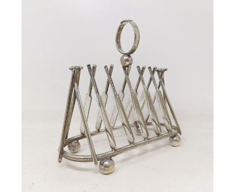 A late Victorian silver plated novelty toast rack, the divisions in the form of cricket bats, 18 cm wide