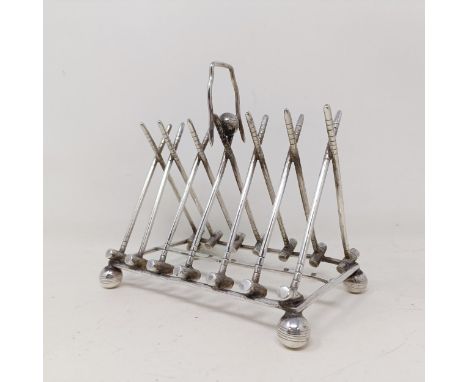 A late Victorian silver plated novelty toast rack, the divisions in the form of croquet mallets, 17 cm wide