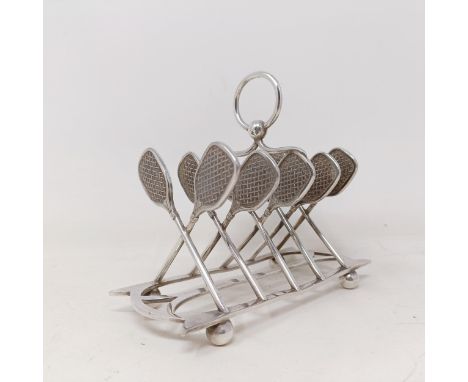 A late Victorian silver plated novelty toast rack, the divisions in the form of tennis racquets, 16 cm wide