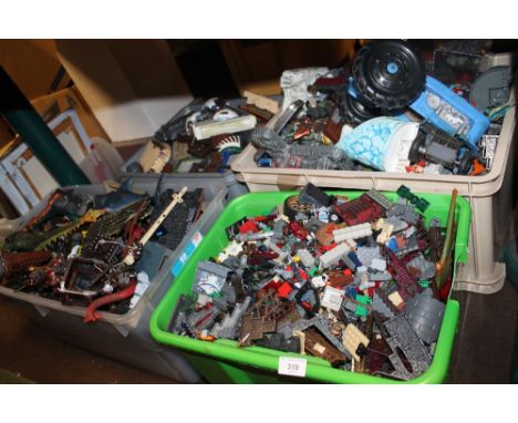 FOUR BOXES OF LEGO & MEGA BLOKS DRAGONS (KRYSTAL WAR METAL AGES) CONSTRUCTION PIECES, together with a Marx plastic battery op