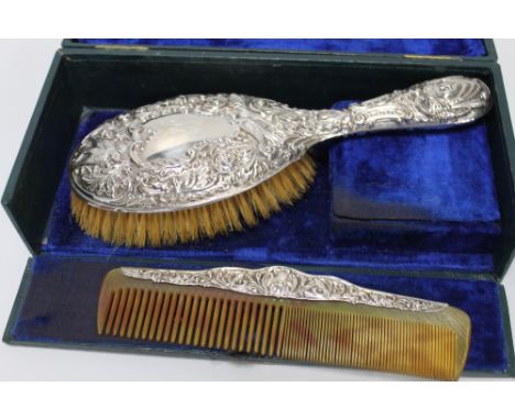 A HALLMARKED SILVER COMB AND BRUSH