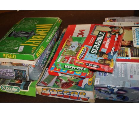 A QUANTITY OF ASSORTED BOARD GAMES, TO INCLUDE SUBBUTEO, MONOPOLY, CONNECT FOUR ETC