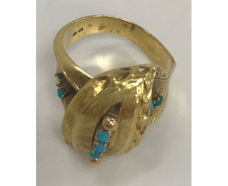 An 18-carat gold and turquoise set crossover ring, size J, 7.3g