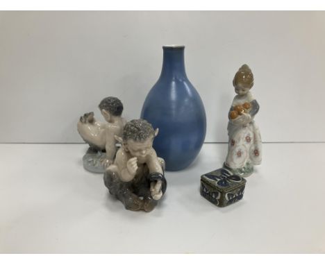 A box containing two Royal Copenhagen figures of fawns, one with a frog, No'd. "1713144" to base, the other with a snake, No'