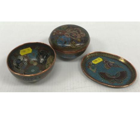 A Chinese cloisonne lidded bowl with floral medallion and butterfly decoration, raised on a circular foot, 9 cm diameter x 6 