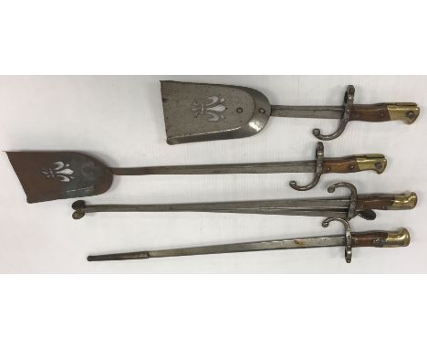 A collection of various metal wares to include a six piece fire iron set constructed from 19th Century French bayonets, inclu