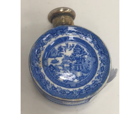 A Victorian silver mounted pottery moon flask scent bottle with Willow pattern decoration, bears rubbed hallmark, possibly by