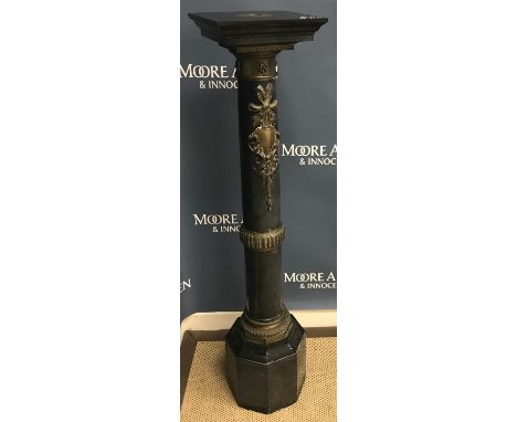 A 19th Century black marble and brass embellished column, the square top set with central brass recess stamped "GK4" over a t
