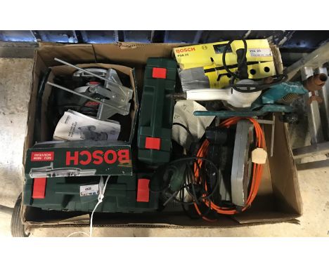 A Bosch POF 1100 AE router, a Bosch PWS 600 angle grinder, a Bosch PST 680 E jigsaw, a Bosch PSB 400-2 drill, a Black &amp; D