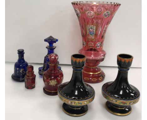 A collection of Victorian Bohemian and other glass to include a large cranberry cut glass and enamel and gilt foliate decorat