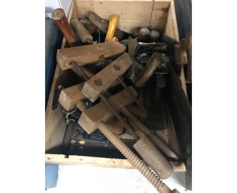 A collection of hand tools to include saws, various planes, chisels, etc, housed in various tool boxes and workman's bags, et
