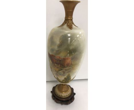 A Royal Worcester vase, the main body decorated by John Stinton with a pair of Highland cattle in a landscape, the narrow nec