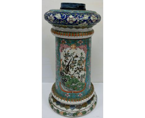 A 19th Century Chinese famille rose porcelain oil lamp, the reservoir with bands of foliate and floral decoration, the main b