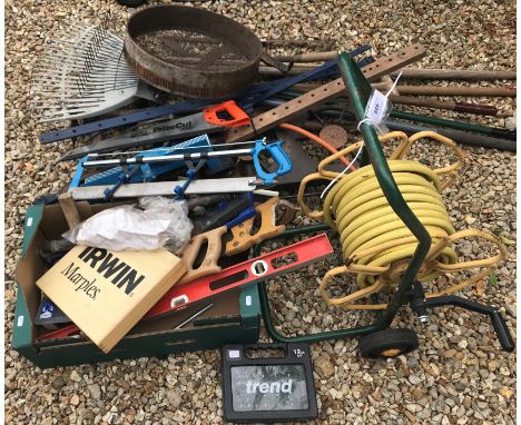 A collection of vintage garden tools to include pickaxes etc, a pair of Draper sash clamps, hose on portable winder, a collec