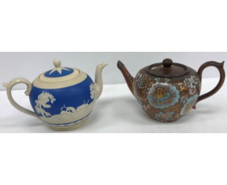 A collection of mainly 19th Century teapots including a Doulton Slater's "Lacework" teapot, a Copeland Spode blue Jasper "Hun