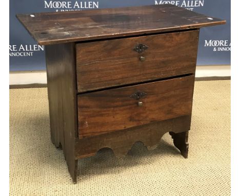 A 19th Century mahogany dwarf chest of two drawers on plank end supports 69.5 cm wide x 39 cm deep x 57.5 cm high, a child's 