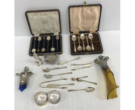 A collection of silver wares to include a cased set of five teaspoons, a case containing six coffee bean spoons and a pair of