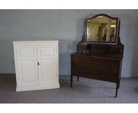 An Edwardian mahogany dressing chest, with hinged mirror over drawers; together with a white painted side cabinet, with field