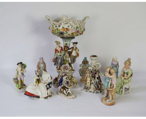 A Dresden porcelain centrepiece, circa 1900, with a pierced and flower encrusted fruit bowl set on a pedestal with Lady and G