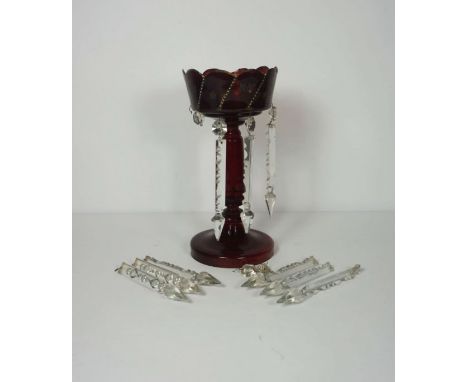 A box of assorted decorative glass, including a Victorian ruby glass lustre, assorted cranberry glass vessels, a castor and o